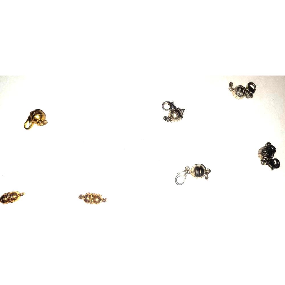 7 Pc Stainless Steel- 2 Oblong Gold- 1 Gold- 4 Silver Barrel Magnetic Extenders